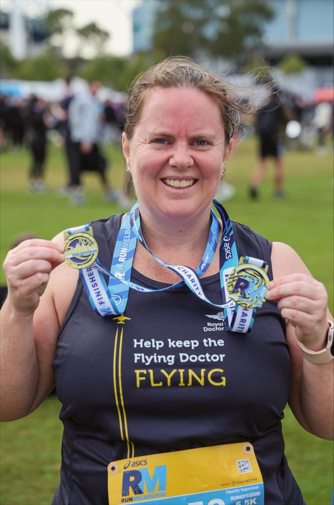 Flight Nurse Ruth with Run Melbourne Medals in 2025